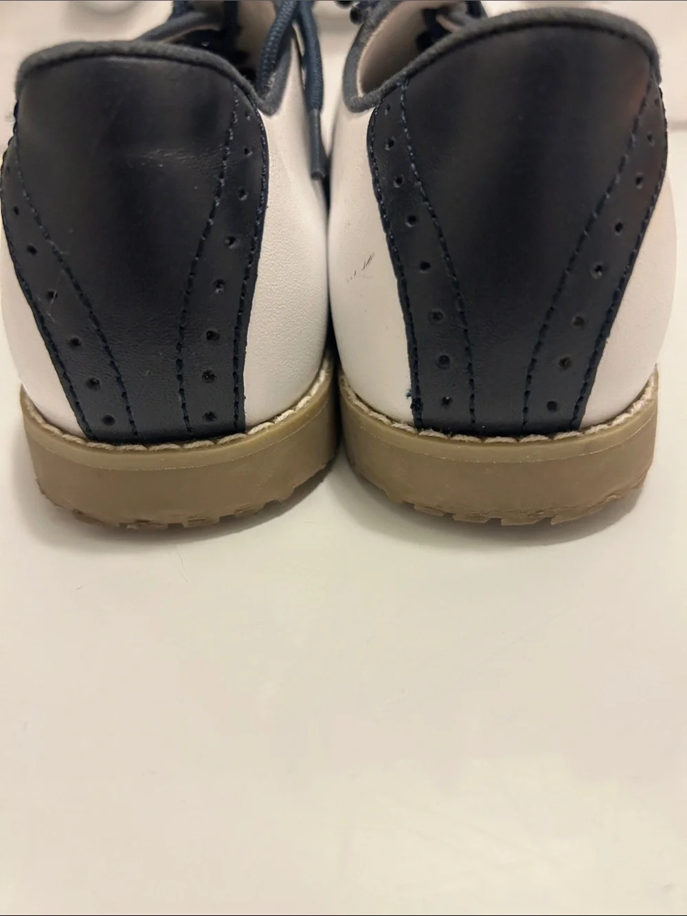 EUC Kiss Lamour navy blue and white saddle oxfords size 2